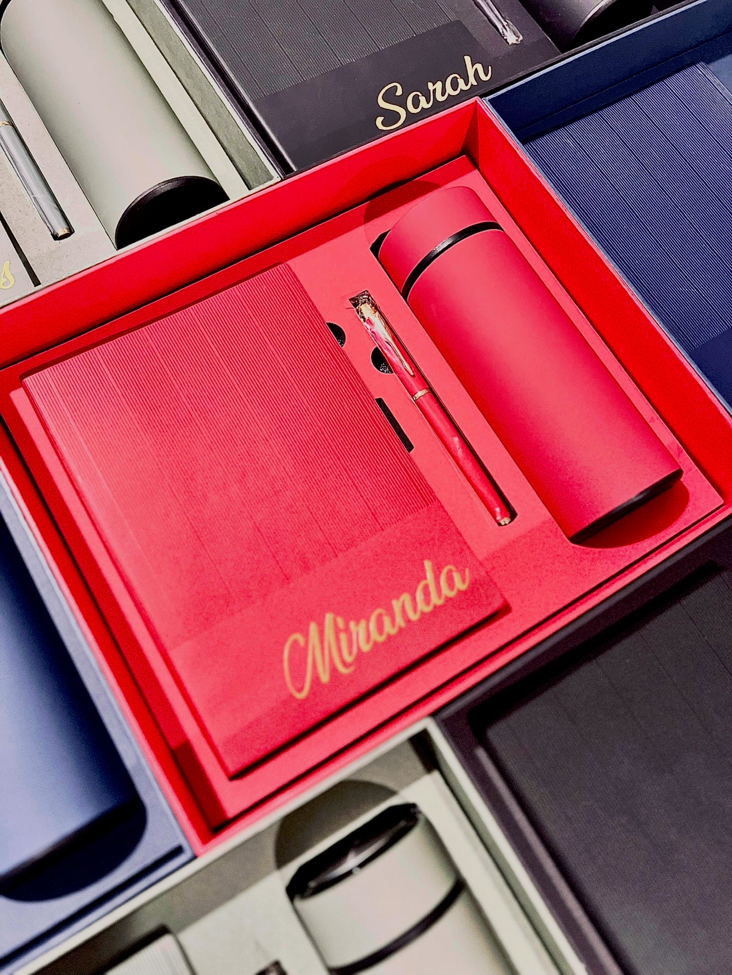 Notepad, tumbler and pen